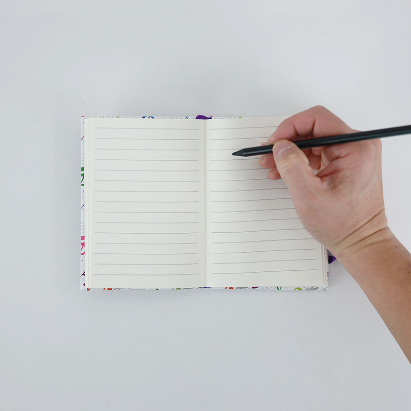 A6 Notebook with Colourful Treble Clefs and Elastic Band